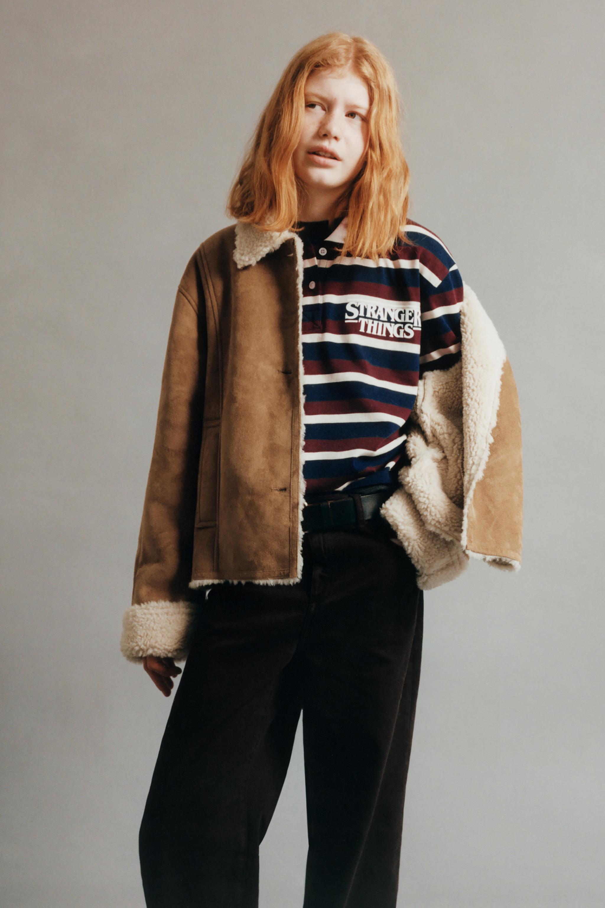 STRIPED STRANGER THINGS © NETFLIX POLO SHIRT